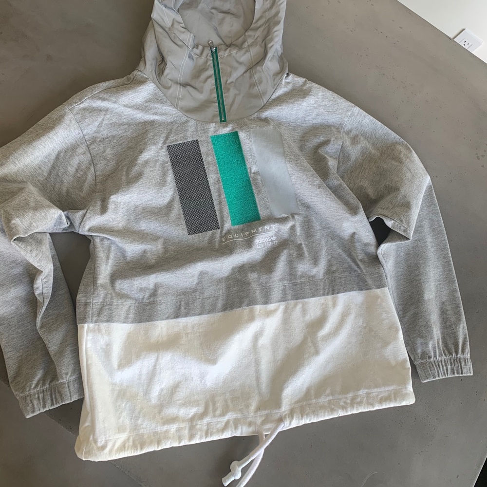 Adidas pull over rain coat.